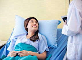 Patient in hospital bed